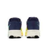 Championes de running New Balance FuelCell SC Elite V5 para mujer, con capellada de malla en tonos azul marino, verde lima y verde menta. Presenta el logo "N" plateado y la inscripción "SC Elite" en el talón. La entresuela es gruesa, de color crema, con detalles degradados en la parte delantera.