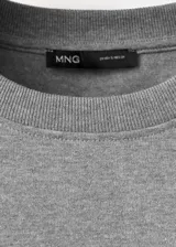Camiseta de manga corta y cuello redondo, de corte oversize, en color gris.