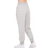 Pantalón deportivo Puma de mujer, color gris melange, con puños ajustados en los tobillos y cintura elástica. Presenta el logo de Puma bordado en negro en la pierna izquierda.