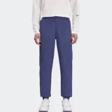 Pantalón deportivo Reebok Classics Vector azul con cintura elástica y cordones ajustables.