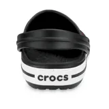 Zuecos Crocs modelo Crocband™ en color lila claro con plataforma blanca y una línea decorativa morada. Presentan el diseño clásico con orificios de ventilación y tira trasera ajustable.