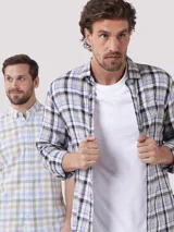 Camisa de manga larga a cuadros azules, beige y negros, confeccionada en lino y algodón.