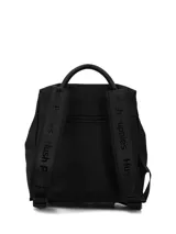 Mochila urbana negra de diseño compacto, confeccionada en material sintético con acabado mate. Presenta una solapa superior con correas decorativas y hebillas metálicas, cierre principal con cremallera, bolsillo frontal con cierre y tiradores con cordón. Incluye asa superior y correas ajustables para los hombros.