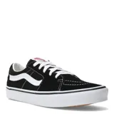 Championes Vans modelo UA SK8, de diseño clásico con capellada de gamuza y lona en color negro. Presenta la icónica banda lateral Sidestripe en color blanco, cordones al tono y suela de goma vulcanizada con patrón waffle.