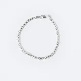 Pulsera de cadena estilo Bismark confeccionada en plata 925, con eslabones entrelazados que crean un diseño plano y continuo.