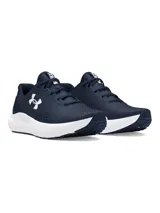 Championes de running Under Armour modelo Charged Surge 4, color azul marino con entresuela blanca. Presentan parte superior de malla transpirable con superposiciones sintéticas, amortiguación Charged Cushioning y suela de goma resistente.