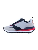 Championes urbanos Umbro modelo Venturi, con diseño multicolor en tonos gris, azul marino, blanco y detalles en rojo. Confeccionados en una combinación de cuero y malla, cuentan con suela de EVA y TPR para mayor confort y tracción.