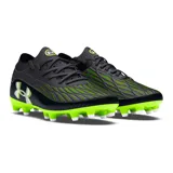 Championes de fútbol Under Armour Magnetico Pro 4 FG, modelo en color negro con detalles en verde lima y suela verde brillante con tapones cónicos. Presenta el logo de la marca en el lateral con efecto degradado.