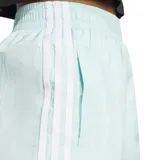 Pantalón deportivo Adidas Adicolor Teamgeist color verde agua, de corte ancho y tiro alto, con cintura elástica y logo bordado en la pierna.