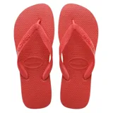 Ojotas Havaianas modelo Top, color gris oscuro con tiras plateadas metálicas con relieve.