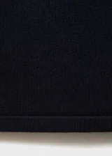 Pantalón wideleg de punto fino y tiro medio, en color negro, con cintura elástica sin cierre y diseño largo.