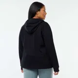 Buzo negro con capucha y cierre frontal, de corte holgado.