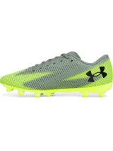 Championes de fútbol Under Armour modelo Shadow Select 3 FG, con diseño en tonos gris y amarillo neón. Presentan una parte superior de piel sintética suave, cierre con cordones, plantilla de EVA para mayor comodidad y suela de TPU con tacos cónicos optimizados para superficies naturales firmes.