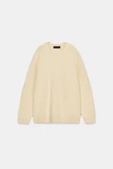 Jersey de punto con mezcla de lana y cashmere, de cuello redondo y manga larga. Presenta un acabado cepillado suave y terminaciones en rib en cuello, puños y bajo.