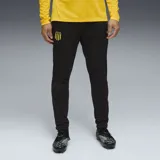 Pantalón de entrenamiento Puma del Club Atlético Peñarol, color negro, con ajuste entallado, cintura elástica y escudo del club en el muslo derecho.