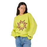 Buzo de punto Rip Curl color amarillo neón, con diseño de sol en el frente y logo de la marca en el puño. Presenta cuello redondo, mangas largas y un calce relajado.