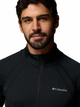 Buzo de media cremallera Columbia Polar Stealth Spring Ls Hz Omni-Shade color negro, de manga larga con orificios para los pulgares en los puños.