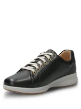 Championes Hush Puppies modelo Spinal Laceup de cuero color negro, con cordones grises, ojalillos metálicos dorados, entresuela gris y suela de goma.