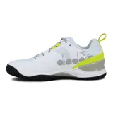 Championes deportivos Diadora modelo Blushield Torneo 2, de color blanco con detalles en negro, gris y amarillo flúor, diseñados para tenis y deportes en cancha.