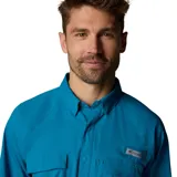 Camisa de pesca de manga larga Columbia, color azul, con cuello clásico, cierre frontal con botones a presión, múltiples bolsillos funcionales en el pecho y ventilación trasera. Incluye tecnología de protección solar y absorción de humedad.