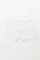 Boxer de algodón blanco con elástico en la cintura que lleva la inscripción "Uniform" repetida en tono gris claro.