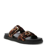 Sandalias planas Miss Carol Brava con diseño tipo slide, doble tira ancha de pelo sintético con estampado animal print de leopardo, hebillas metálicas doradas y suela negra con plataforma baja.