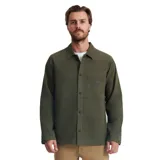 Camisa verde militar de manga larga con diseño a cuadros, bolsillo en el pecho y cierre con botones.