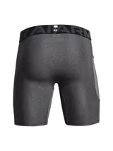 Calza corta de compresión Under Armour, modelo HeatGear, color gris jaspeado. Cuenta con cintura elástica ancha con logo de la marca, paneles de malla para ventilación y un bolsillo lateral de almacenamiento.