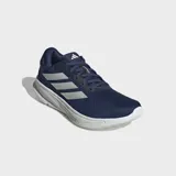Championes de running Adidas Supernova Ease, color azul marino con las tres franjas características en plateado. Cuentan con una mediasuela gruesa de espuma blanca con tecnología Dreamstrike+.