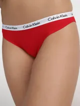 Bombacha Calvin Klein tipo tanga, color rojo, con cintura elástica blanca con logo de la marca.