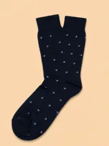 Medias de algodón color azul marino con estampado de pequeños rombos geométricos en tonos claros.