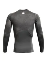 Remera de compresión Under Armour HeatGear Armour de manga larga, color gris jaspeado con detalles en gris liso en hombros y laterales.