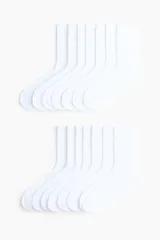 Pack de siete pares de medias deportivas de caña acanalada y diseño liso, confeccionadas en punto funcional con tecnología DryMove para absorción del sudor.