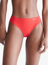 Colaless rojo de microfibra suave con bordes cortados a láser y logo de Calvin Klein estampado en la cadera.