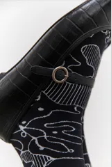 Set de tres pares de medias de caña media con diseños estampados.