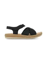 Sandalia de cuero nobuck color negro, con tiras cruzadas en el empeine y tira ajustable con velcro en el talón. Cuenta con suela plana efecto corcho y plantilla acolchada.