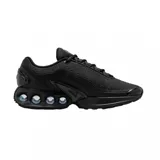 Championes Nike Air Max Dn, color negro, con diseño moderno de malla técnica y tecnología de amortiguación visible en la suela.