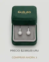 Caravanas de plata con diseño colgante en forma de esfera pavé, completamente cubiertas de circonias brillantes.