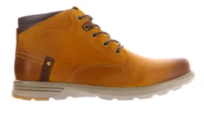 Bota de hombre Freeway de caña media, color azul marino oscuro, confeccionada en cuero liso con cuello acolchado. Presenta cierre de cordones con ojales metálicos en forma de 'C' y suela de goma gruesa con detalle en color caramelo en la parte delantera.