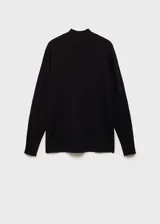 Jersey de punto fino con cuello perkins, manga larga y diseño recto oversize con terminaciones en canalé.