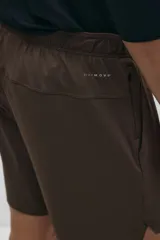 Short deportivo de tejido funcional con tecnología DryMove para absorción de sudor. Presenta corte estándar, cintura elástica con cordón de ajuste, bolsillos laterales y un bolsillo con cierre oculto. Incluye aberturas laterales en el bajo.