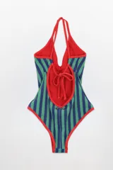 Malla entera con estampado a rayas verticales en verde y azul, con borde rojo y detalle de moño blanco en el centro.