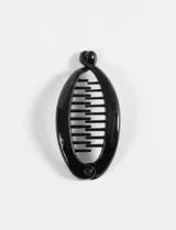 Broche para el pelo negro con forma ovalada y cierre curvo. Estilo vintage.