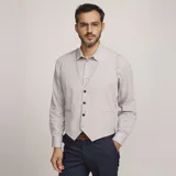Chaleco reversible Due Volti de corte sastrero, con diseño a cuadros en tonos de gris y cierre frontal con cuatro botones oscuros.