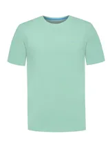 Remera de jersey color verde agua, de corte recto, cuello redondo y manga corta.