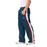 Pantalon de jogging Rusty, color verde petróleo con franjas laterales en color bordó. Presenta cintura elástica con cordón ajustable y logo de la marca bordado en la pierna.