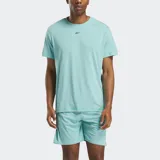 Remera deportiva Reebok de manga corta y cuello redondo, color verde menta melange, con el logo de Reebok en negro en el pecho.