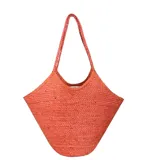 Bolso de yute de algodón color coral con asas trenzadas.