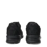 Championes urbanos New Balance modelo 509, color negro, confeccionados en una combinación de malla y gamuza, con el logo característico en los laterales y suela de goma resistente.