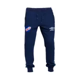 Pantalón de jogging azul marino con cintura elástica ajustable con cordón, bolsillos laterales con cierre y puños elásticos. Logo de Umbro y escudo del Club Nacional de Football estampados en el frente.